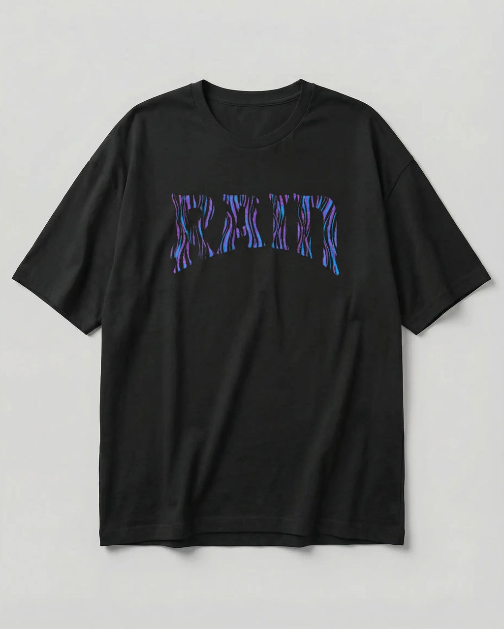 A black short-sleeve crewneck t-shirt featuring a stylized 'RATM' graphic across the chest in a purple and blue zebra-like pattern, displayed against a neutral light gray background.