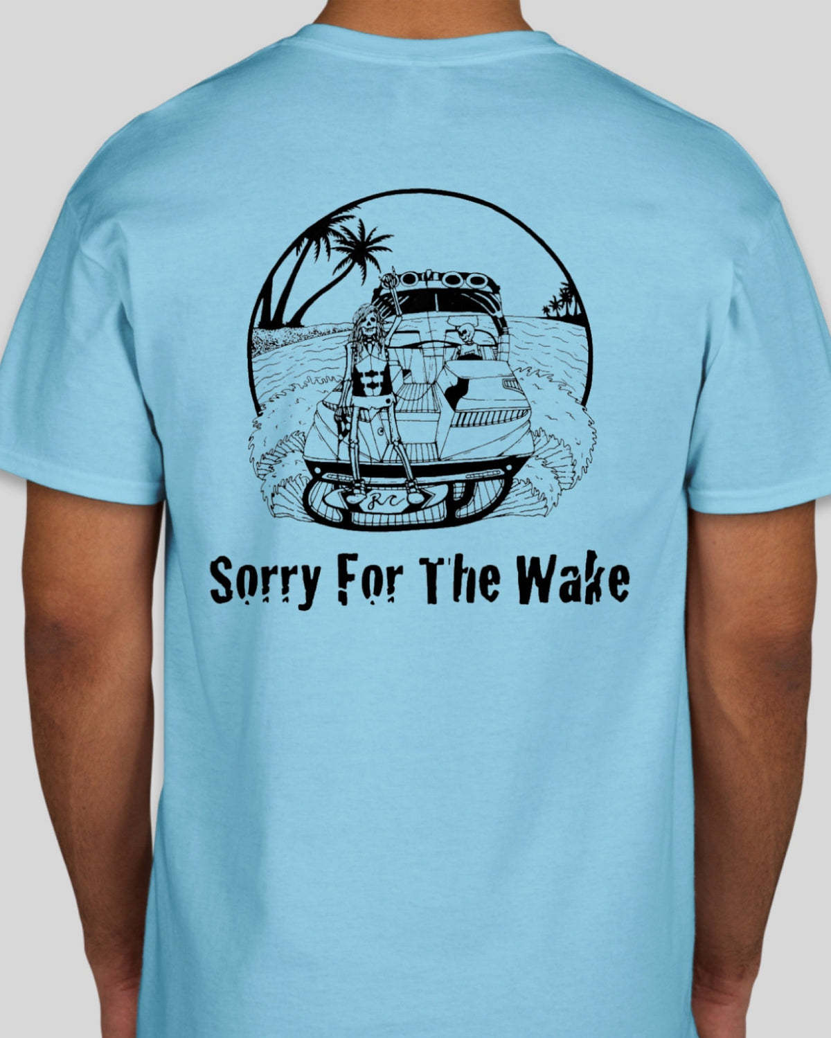 A light blue short-sleeve t-shirt shown from the back on a model, featuring a black graphic of a speedboat leaving a large wake with the text 'Sorry For The Wake' underneath.