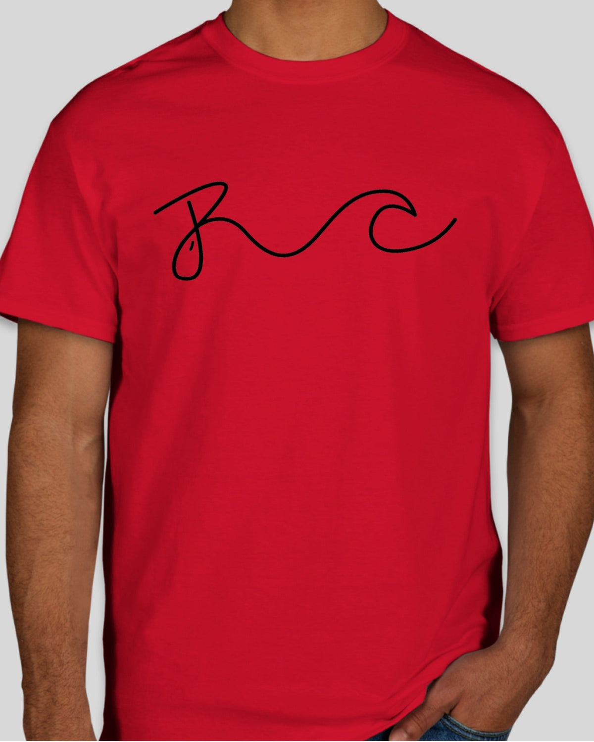 A red short-sleeve crewneck t-shirt with a black cursive 'BC' graphic on the chest, worn by a model against a light gray background.